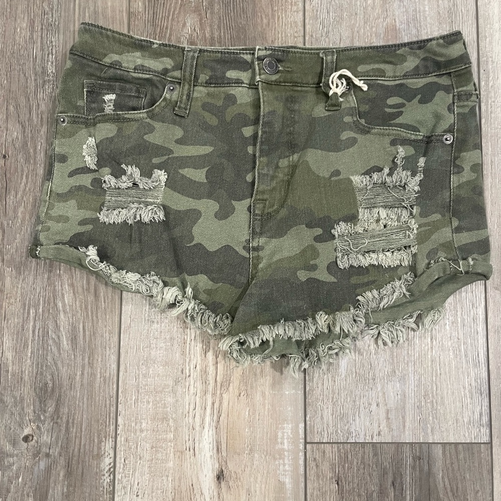 Camouflage jean shorts.